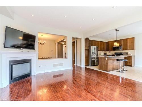 1108 Savoline Boulevard, Milton, ON - Indoor Photo Showing Kitchen With Fireplace