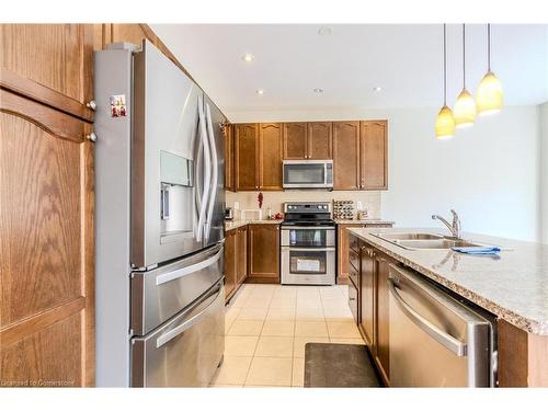 1108 Savoline Boulevard, Milton, ON - Indoor Photo Showing Kitchen With Double Sink