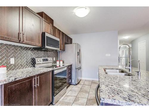 106-135 Hardcastle Drive, Cambridge, ON - Indoor Photo Showing Kitchen With Double Sink