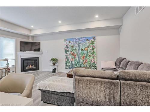 80 Mill Race Crescent, St. Jacobs, ON - Indoor Photo Showing Living Room With Fireplace