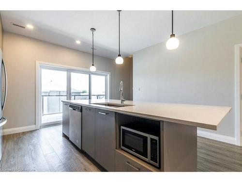 905-361 Quarter Town Line, Tillsonburg, ON - Indoor Photo Showing Kitchen With Double Sink With Upgraded Kitchen