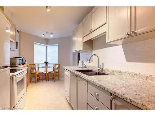 507-300 Keats Way, Waterloo, ON - Indoor Photo Showing Kitchen With Double Sink