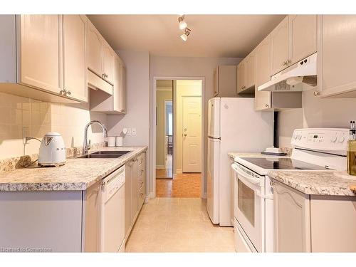 507-300 Keats Way, Waterloo, ON - Indoor Photo Showing Kitchen With Double Sink