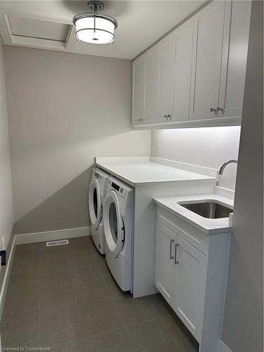 35-40 Walker Road, Ingersoll, ON - Indoor Photo Showing Laundry Room