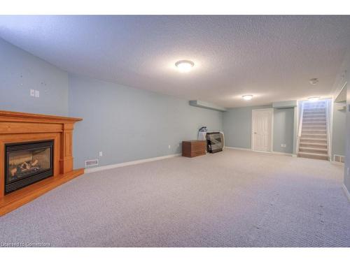 144-20 Isherwood Avenue, Cambridge, ON - Indoor Photo Showing Living Room With Fireplace