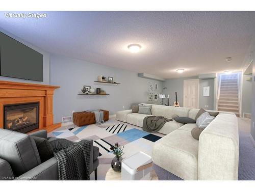 144-20 Isherwood Avenue, Cambridge, ON - Indoor Photo Showing Living Room With Fireplace