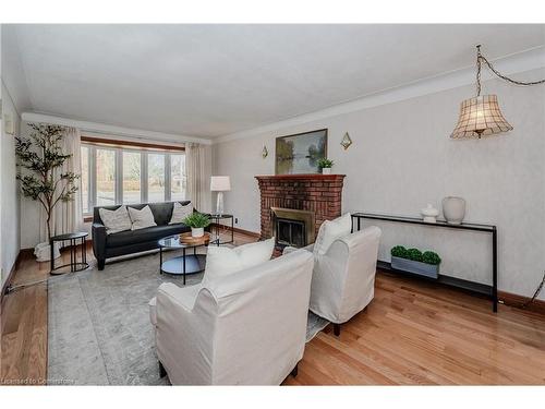 1443 Wrigley Road, Ayr, ON - Indoor Photo Showing Living Room With Fireplace