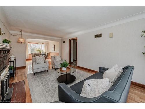 1443 Wrigley Road, Ayr, ON - Indoor Photo Showing Living Room With Fireplace