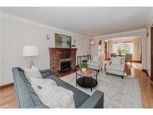 1443 Wrigley Road, Ayr, ON - Indoor Photo Showing Living Room With Fireplace