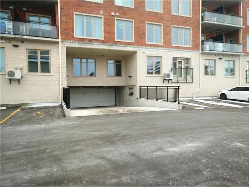 204-175 Commonwealth Street, Kitchener, ON - Outdoor With Balcony With Facade