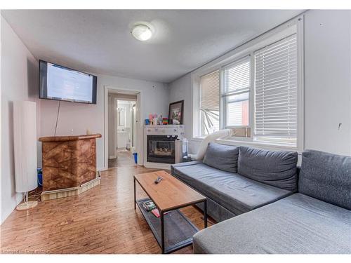 22 Ezra Avenue, Waterloo, ON - Indoor Photo Showing Living Room With Fireplace