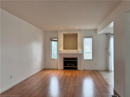 213 Max Becker Drive, Kitchener, ON - Indoor Photo Showing Living Room With Fireplace