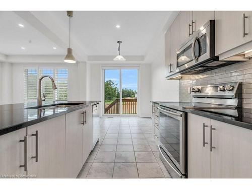 403 Equestrian Way, Cambridge, ON - Indoor Photo Showing Kitchen With Upgraded Kitchen