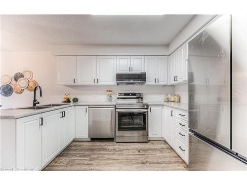 4-468 Doon South Drive, Kitchener, ON - Indoor Photo Showing Kitchen With Double Sink