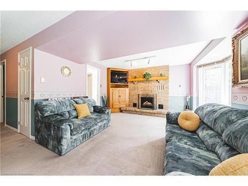 27 Westchester Drive, Kitchener, ON - Indoor Photo Showing Living Room With Fireplace