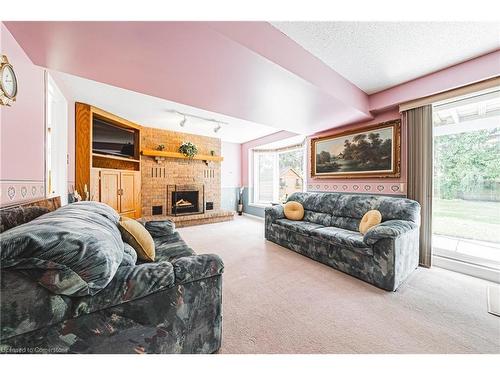 27 Westchester Drive, Kitchener, ON - Indoor Photo Showing Living Room With Fireplace