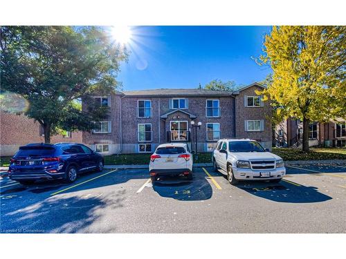 4-323 Northlake Drive, Waterloo, ON - Outdoor With Facade