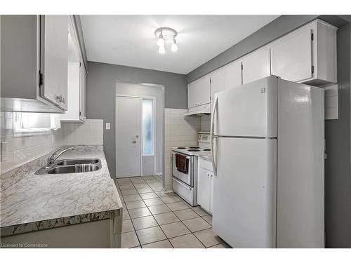 104 Strathcona Crescent, Kitchener, ON - Indoor Photo Showing Kitchen With Double Sink