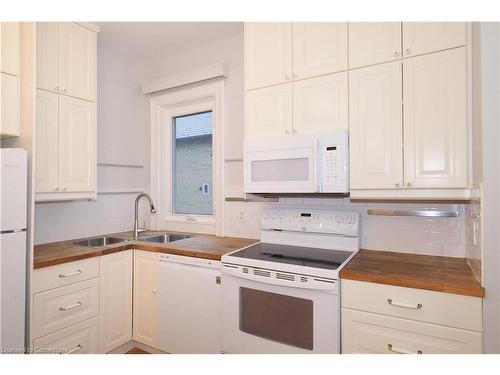 18 Tweed Street, Waterloo, ON - Indoor Photo Showing Kitchen With Double Sink