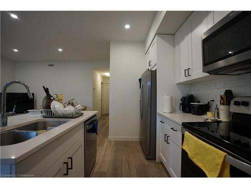 A1-405 Myers Road, Cambridge, ON - Indoor Photo Showing Kitchen With Double Sink