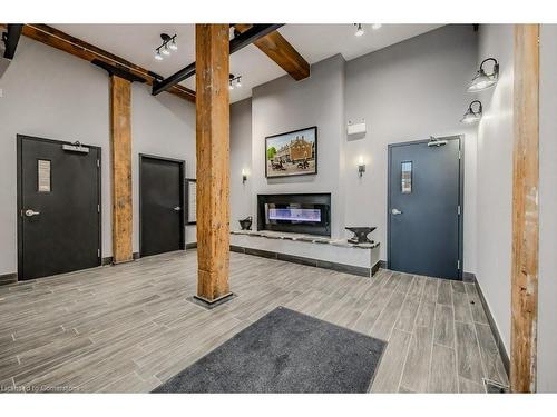 209-24 Cedar Street, Cambridge, ON - Indoor Photo Showing Other Room With Fireplace