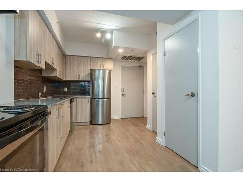 F215-275 Larch Street, Waterloo, ON - Indoor Photo Showing Kitchen With Stainless Steel Kitchen