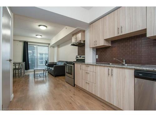 F215-275 Larch Street, Waterloo, ON - Indoor Photo Showing Kitchen With Upgraded Kitchen