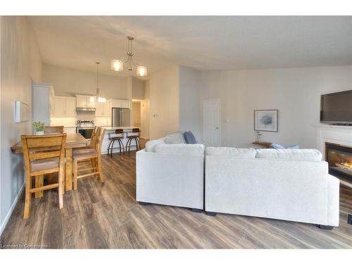 31 Bankside Drive, Kitchener, ON - Indoor Photo Showing Living Room With Fireplace