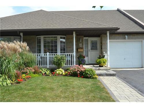 31 Bankside Drive, Kitchener, ON - Outdoor With Deck Patio Veranda With Facade