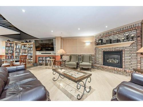 1106-250 Glenridge Drive, Waterloo, ON - Indoor Photo Showing Living Room With Fireplace