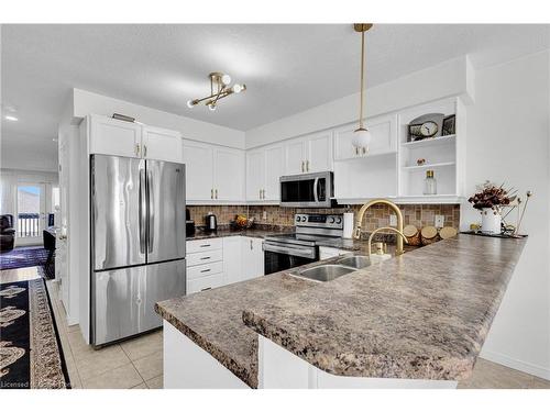 17B-50 Howe Drive, Kitchener, ON - Indoor Photo Showing Kitchen With Double Sink With Upgraded Kitchen