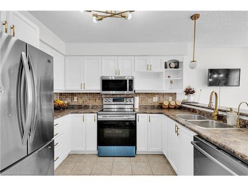 17B-50 Howe Drive, Kitchener, ON - Indoor Photo Showing Kitchen With Double Sink