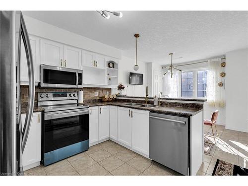 17B-50 Howe Drive, Kitchener, ON - Indoor Photo Showing Kitchen With Double Sink