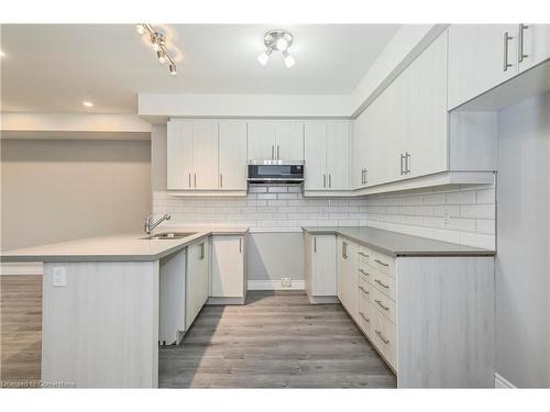 210-161 Ottawa Street, Kitchener, ON - Indoor Photo Showing Kitchen