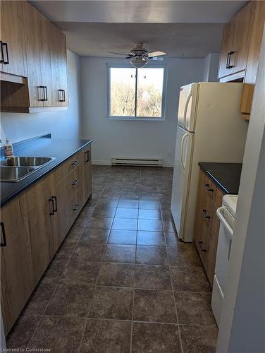 202-4 Avalon Place, Kitchener, ON - Indoor Photo Showing Kitchen With Double Sink