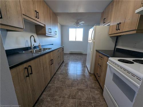 202-4 Avalon Place, Kitchener, ON - Indoor Photo Showing Kitchen With Double Sink