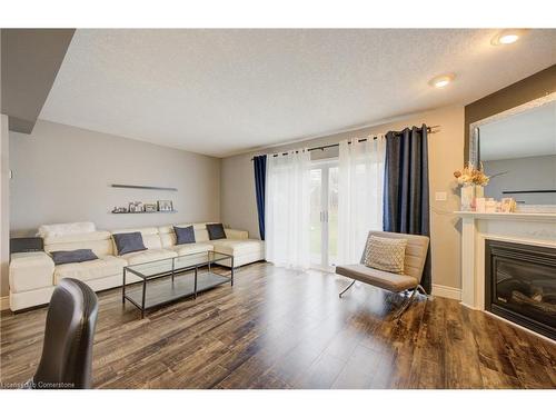 226 Wilderness Drive, Kitchener, ON - Indoor Photo Showing Living Room With Fireplace