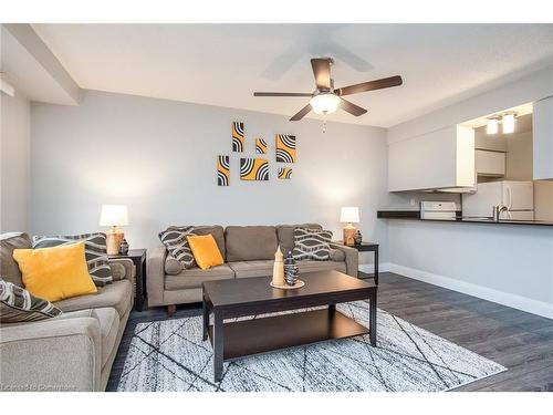 303-275 Eiwo Court, Waterloo, ON - Indoor Photo Showing Living Room