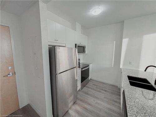 409-60 Charles Street W, Kitchener, ON - Indoor Photo Showing Kitchen With Double Sink