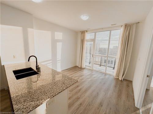 409-60 Charles Street W, Kitchener, ON - Indoor Photo Showing Kitchen With Double Sink