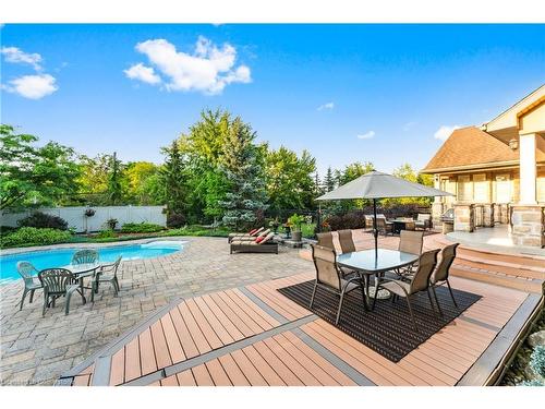 16 Seifert Court, Puslinch, ON - Outdoor With In Ground Pool With Deck Patio Veranda With Backyard