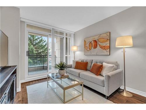 206-2379 Central Park Drive, Oakville, ON - Indoor Photo Showing Living Room