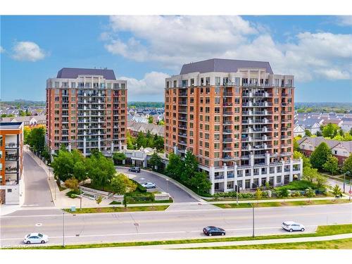 206-2379 Central Park Drive, Oakville, ON - Outdoor With Balcony With Facade