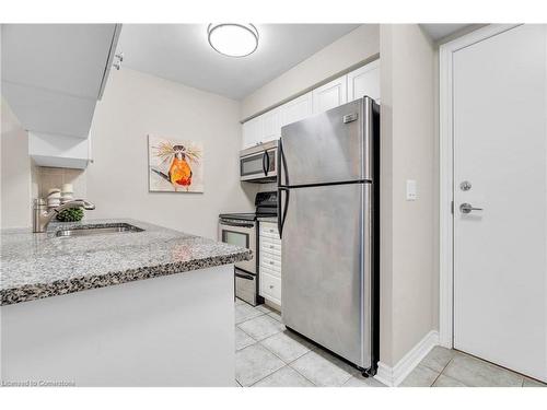 206-2379 Central Park Drive, Oakville, ON - Indoor Photo Showing Kitchen