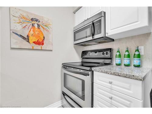 206-2379 Central Park Drive, Oakville, ON - Indoor Photo Showing Kitchen