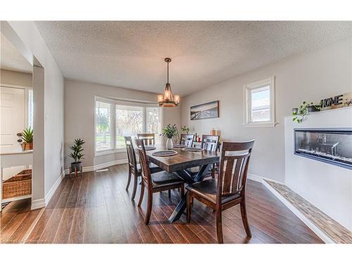 82 Oakhurst Crescent, Kitchener, ON - Indoor Photo Showing Dining Room With Fireplace