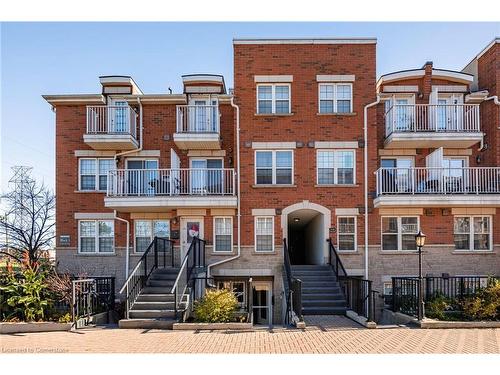 108-37 Four Winds Drive, Toronto, ON - Outdoor With Balcony With Facade