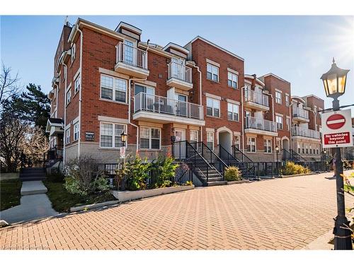 108-37 Four Winds Drive, Toronto, ON - Outdoor With Balcony With Facade