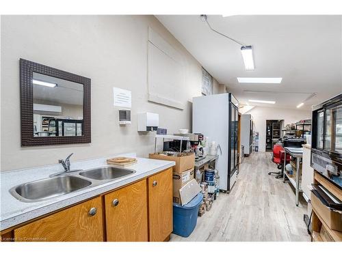 5685 Robinson Street, Niagara Falls, ON - Indoor Photo Showing Kitchen With Double Sink