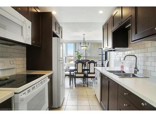 201-200 Jamieson Parkway, Cambridge, ON - Indoor Photo Showing Kitchen With Double Sink